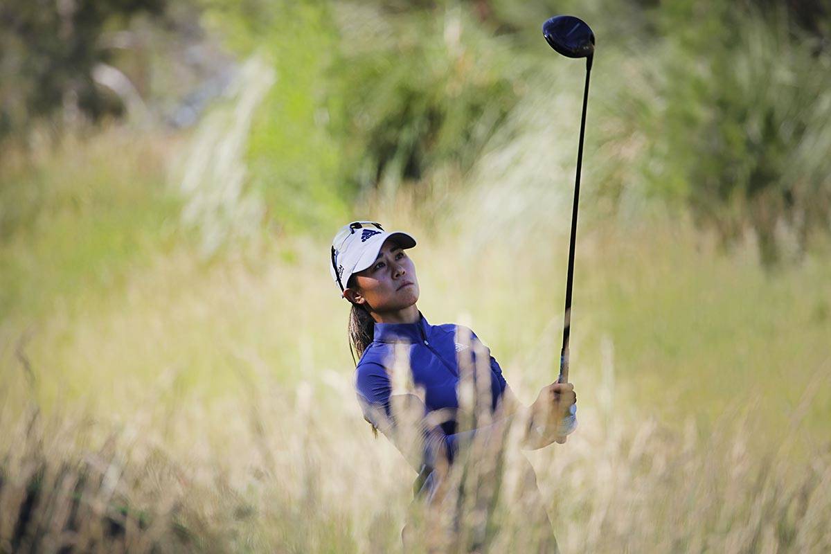 Danielle Kang of USA watches her tee shot on the 14th hole during the third round of the Bank o ...