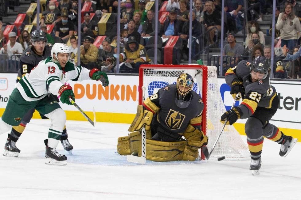 Vegas Golden Knights defenseman Alec Martinez (23) clears the puck way from Vegas Golden Knight ...