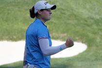 Ally Ewing reacts after finishing on the 18th hole during the quarter final round of the Bank o ...