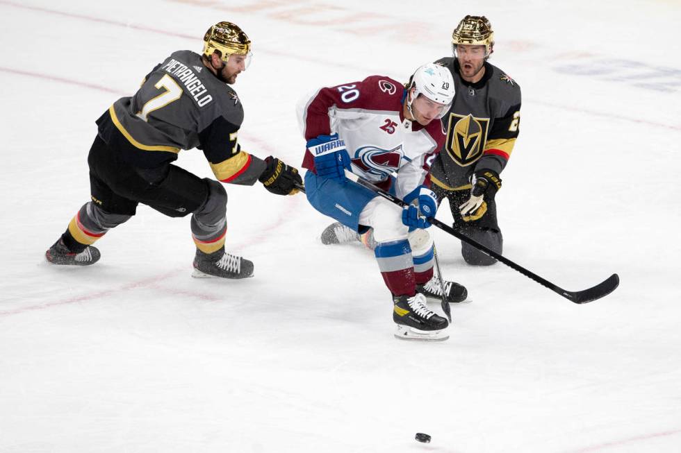 Golden Knights defenseman Alex Pietrangelo (7) and Colorado Avalanche right wing Logan O'Connor ...