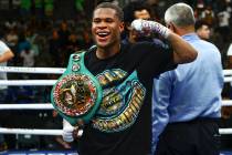Devin Haney celebrates after defeating Jorge Linares by unanimous decision in the WBC lightweig ...