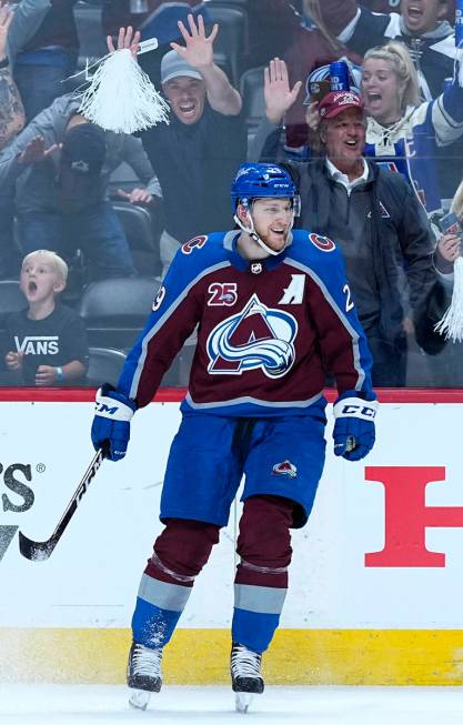 Colorado Avalanche center Nathan MacKinnon (29) celebrates a goal against the Vegas Golden Knig ...