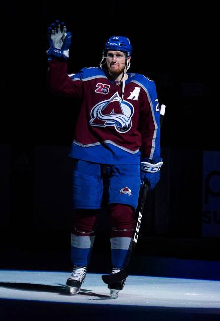 Colorado Avalanche center Nathan MacKinnon (29) waves to the crowd following a win against the ...