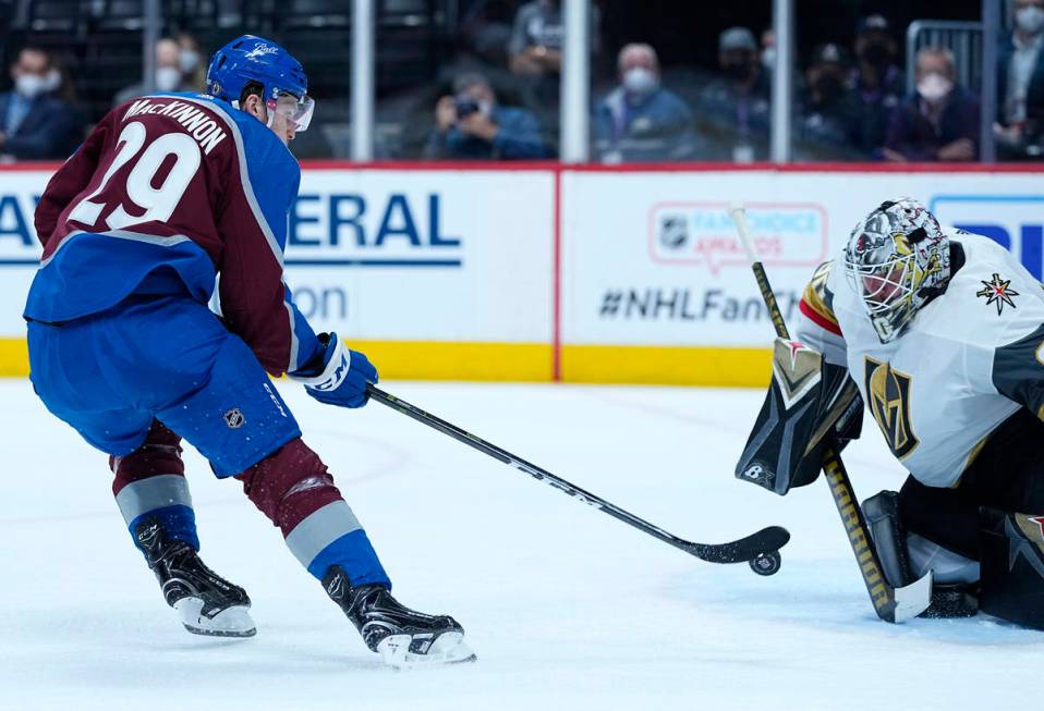 Colorado Avalanche center Nathan MacKinnon (29) scores a goal against Vegas Golden Knights goal ...