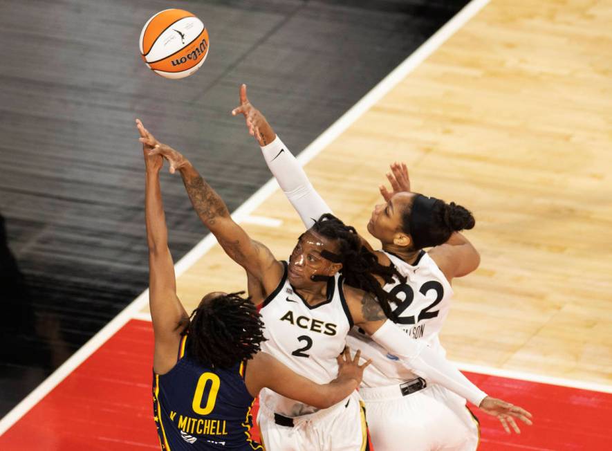 Las Vegas Aces guard Riquna Williams (2) and Las Vegas Aces forward A'ja Wilson (22) combine to ...