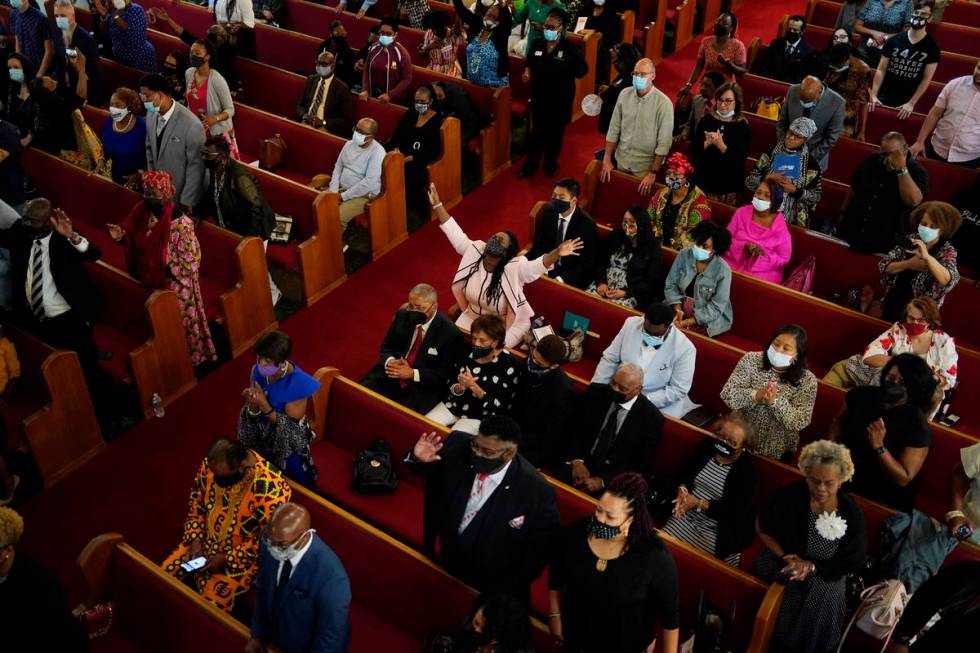 People attend a joint service for the centennial of the Tulsa Race Massacre at First Baptist Ch ...