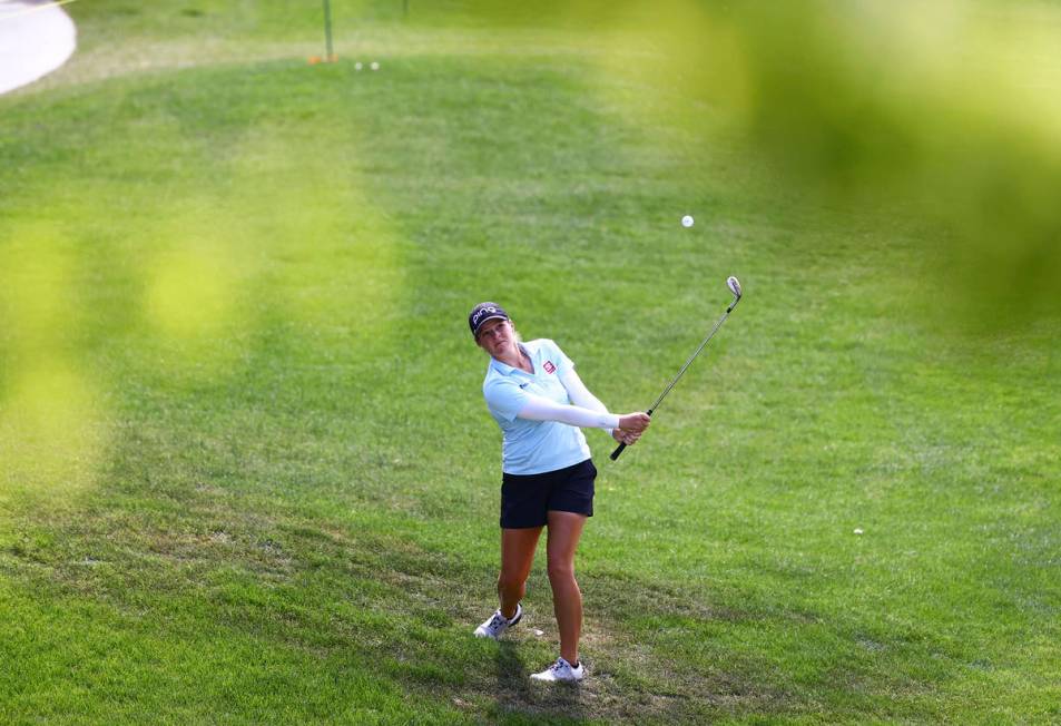 Ally Ewing hits a fairway shot on the fourth hole during the championship round of the Bank of ...