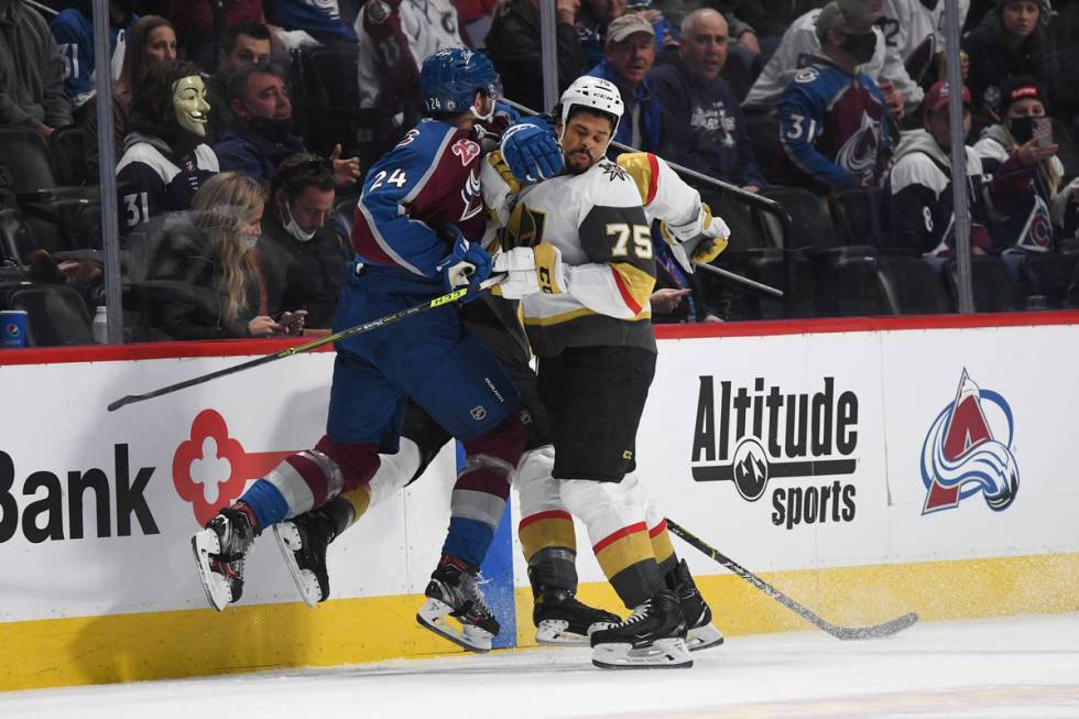 DENVER, COLORADO - MAY 30: Colorado Avalanche defenseman Patrik Nemeth (24), left, hits Vegas G ...