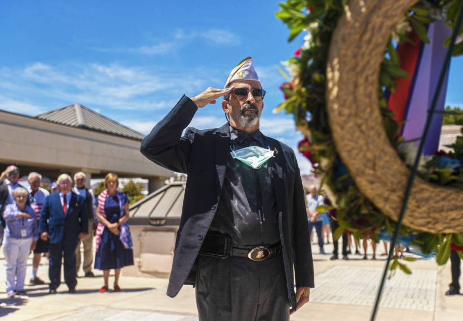 Bill Perlmutter, chairman of the Southern Nevada Memorial Cemetery Advisory Committee, pays tri ...