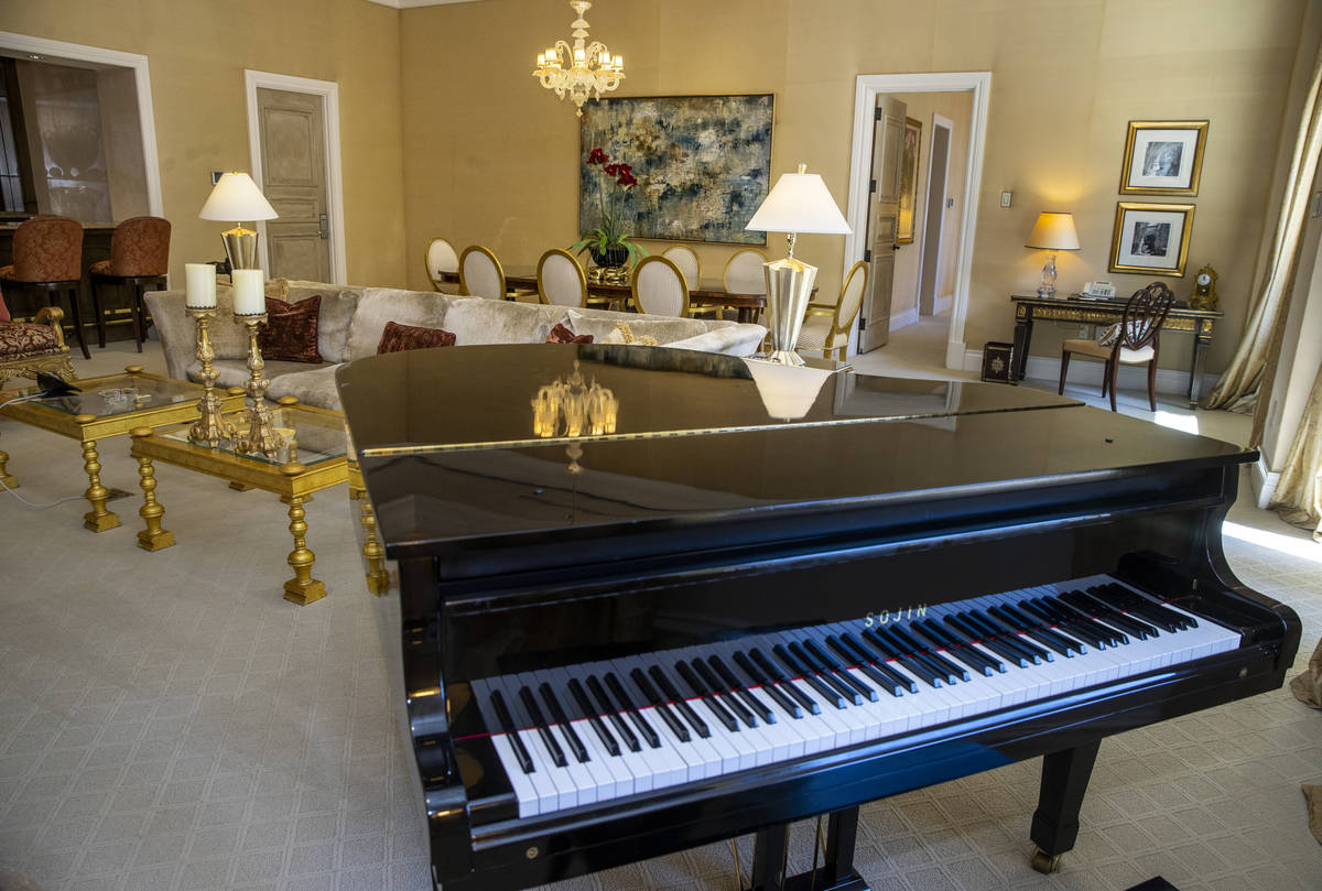 A piano is one of the amenities within one of the Palazzo Suites during a tour of the Rio with ...
