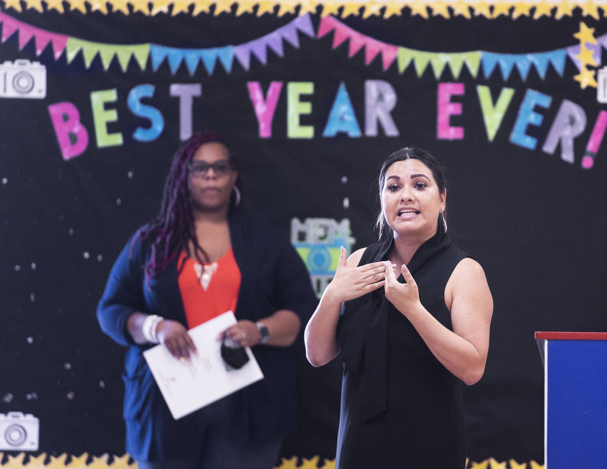 Assistant superintendent Maria Pinienta, right, speaks during a parent meeting at TEACH Las Veg ...