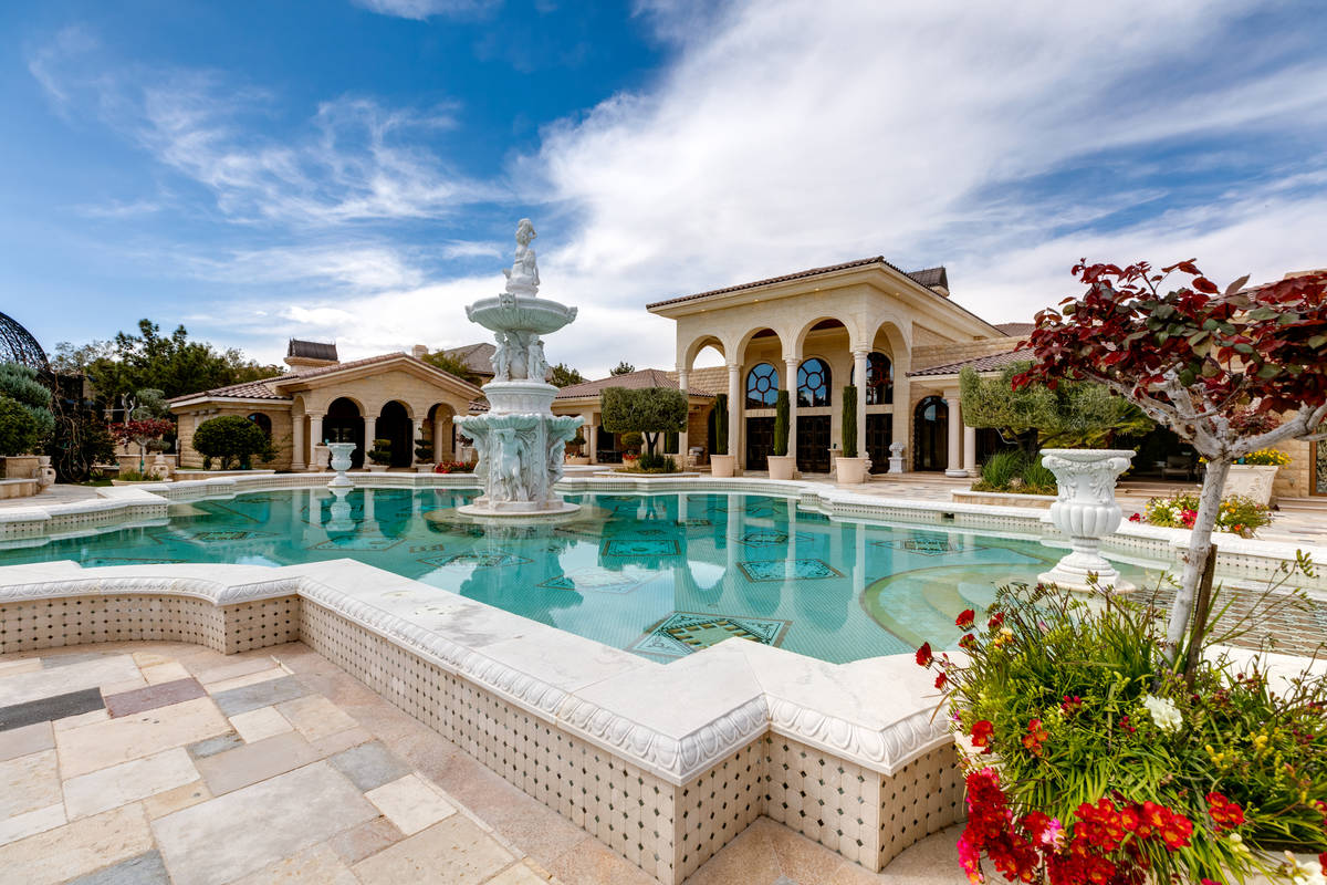 Fountains and statuary at 9409 Kings Gate Court in Las Vegas. (The Ivan Sher Group, Berkshire H ...