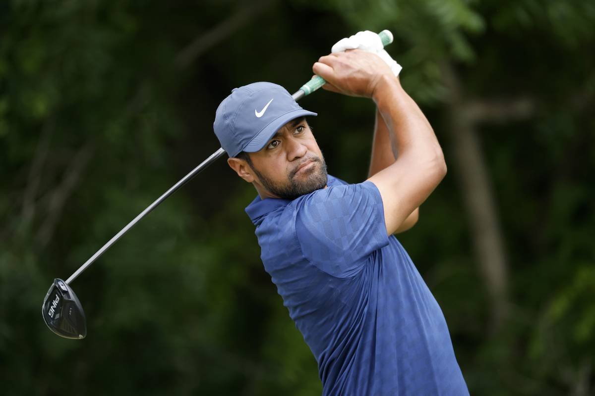 Tony Finau follows through on his shot off the sixth tee during the third round of the Charles ...