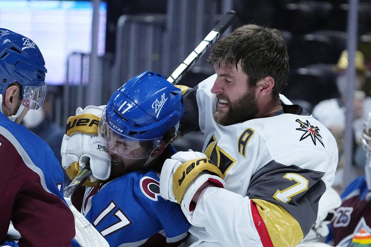 Vegas Golden Knights defenseman Alex Pietrangelo (7) fights with Colorado Avalanche center Tyso ...