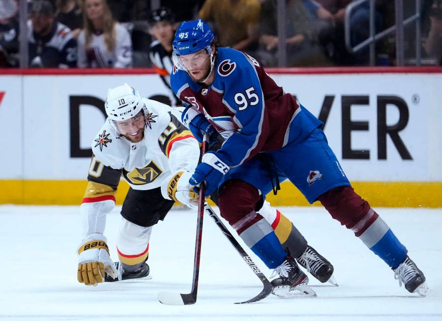 Colorado Avalanche left wing Andre Burakovsky (95) moves the puck against Vegas Golden Knights ...