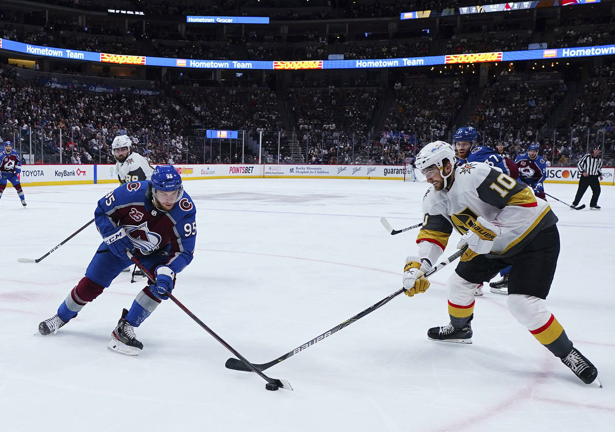 Colorado Avalanche left wing Andre Burakovsky (95) and Vegas Golden Knights center Nicolas Roy ...