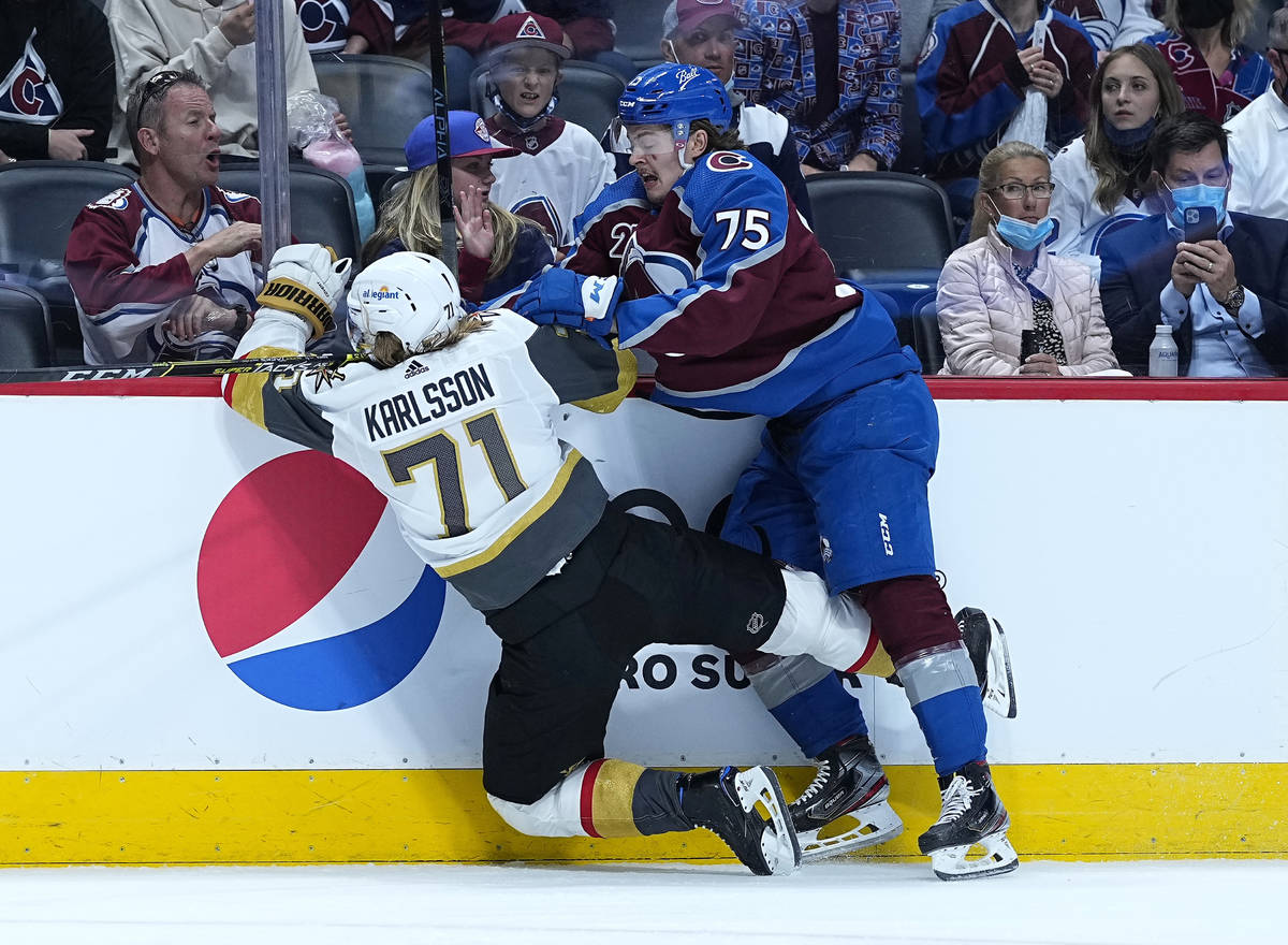 Colorado Avalanche goaltender Justus Annunen (75) knocks Vegas Golden Knights center William Ka ...