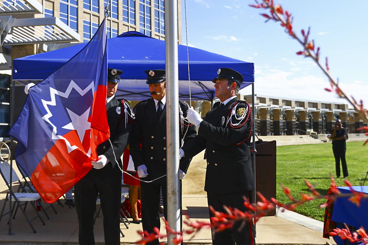 Members of the North Las Vegas Fire Department Honor Guard, from left, Ryan Thatcher, Cameron H ...