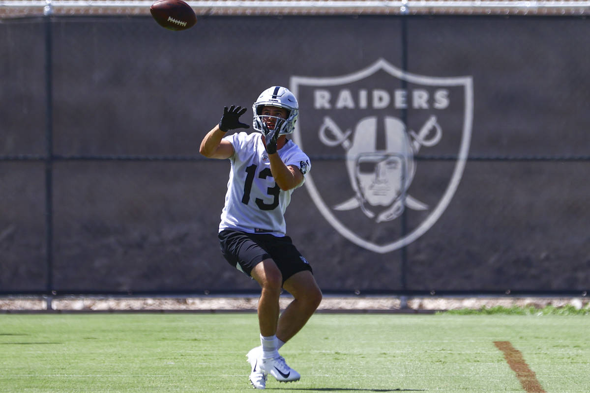 Raiders wide receiver Hunter Renfrow (13) catches a pass during NFL football practice at Raider ...
