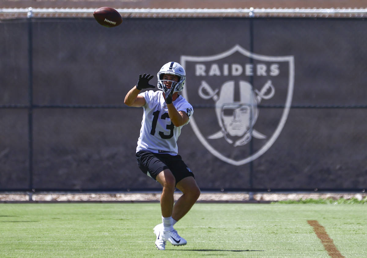 Raiders wide receiver Hunter Renfrow (13) catches a pass during NFL football practice at Raider ...