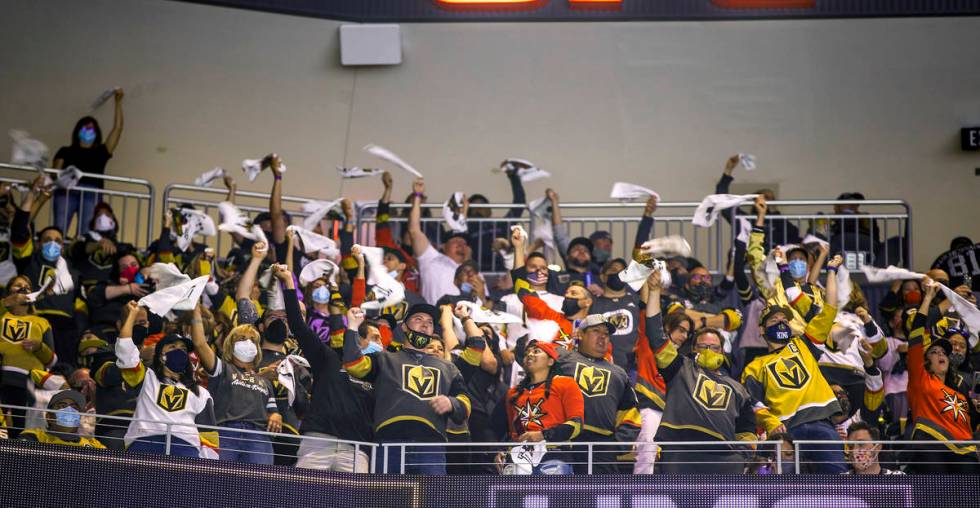 Golden Knights fans in the upper deck cheer versus the Minnesota Wild during the first period o ...