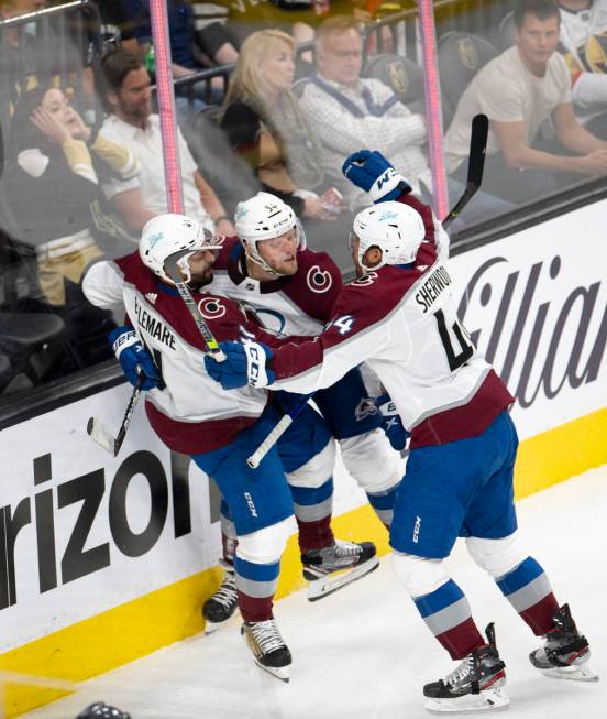 Avalanche center Pierre-Edouard Bellemare (41), Avalanche center Carl Soderberg (34) and Avalan ...