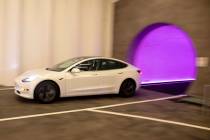 A Tesla electric car enters Central Station of the Boring Company’s Convention Center Loop at ...