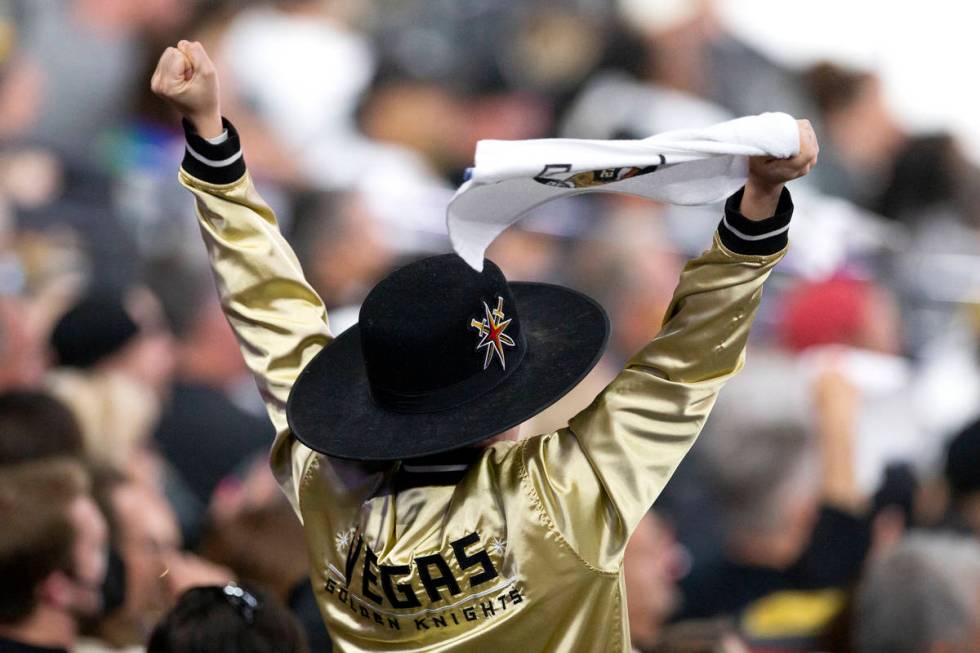 A Golden Knights fan cheers during the first period of Game 3 of a second-round NHL hockey Stan ...