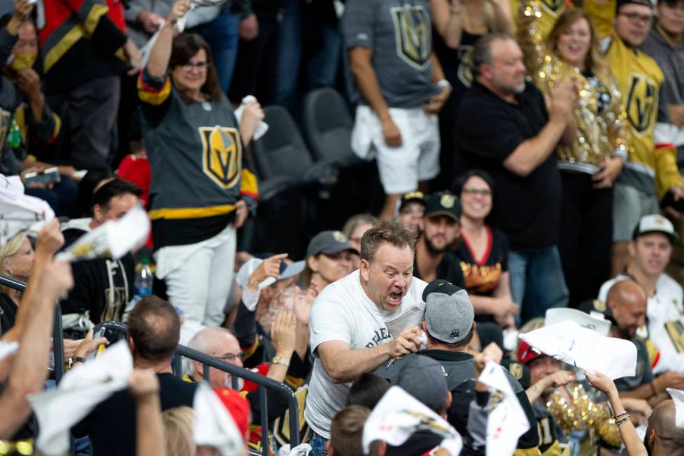 A Golden Knights fan riles up the crowd in the first period of Game 3 of a second-round NHL hoc ...