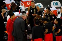 Las Vegas Aces players get together withLas Vegas Aces head coach Bill Laimbeer, center, before ...