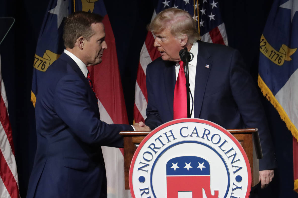 Former President Donald Trump, right, announces his endorsement of N.C. Rep. Ted Budd, left, fo ...