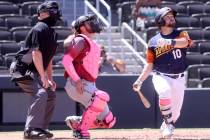 Aviators second baseman Nate Mondou dons pink socks as he watches a fly ball as the Sacramento ...