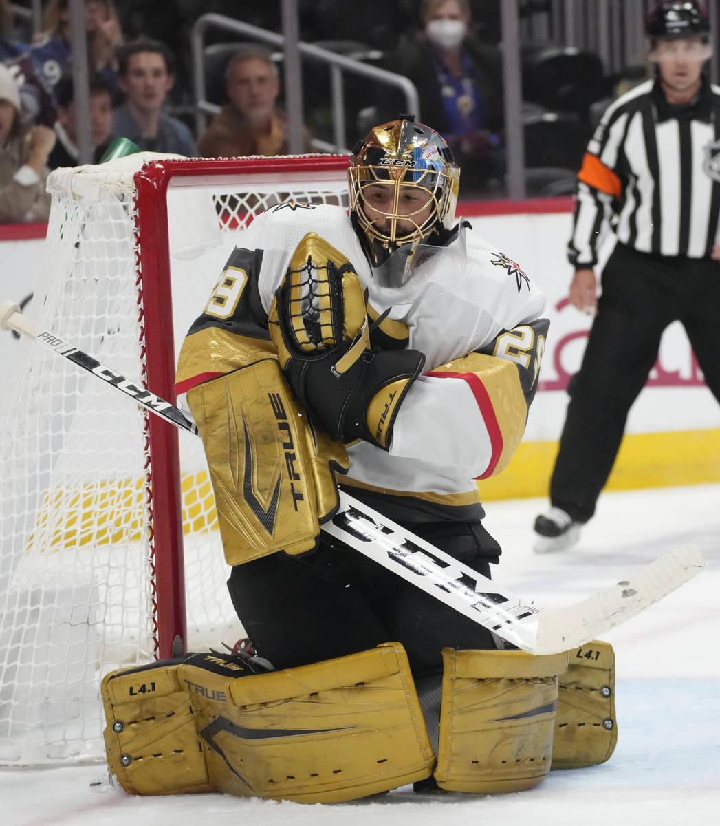 Vegas Golden Knights goaltender Marc-Andre Fleury makes a glove save on a Colorado Avalanche sh ...
