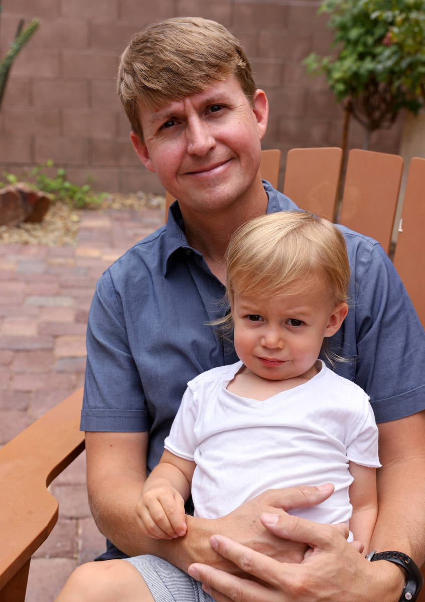 Shane Peterson with his son, Henry, 21 months, at his Henderson home on June 9, 2021. Peterson ...