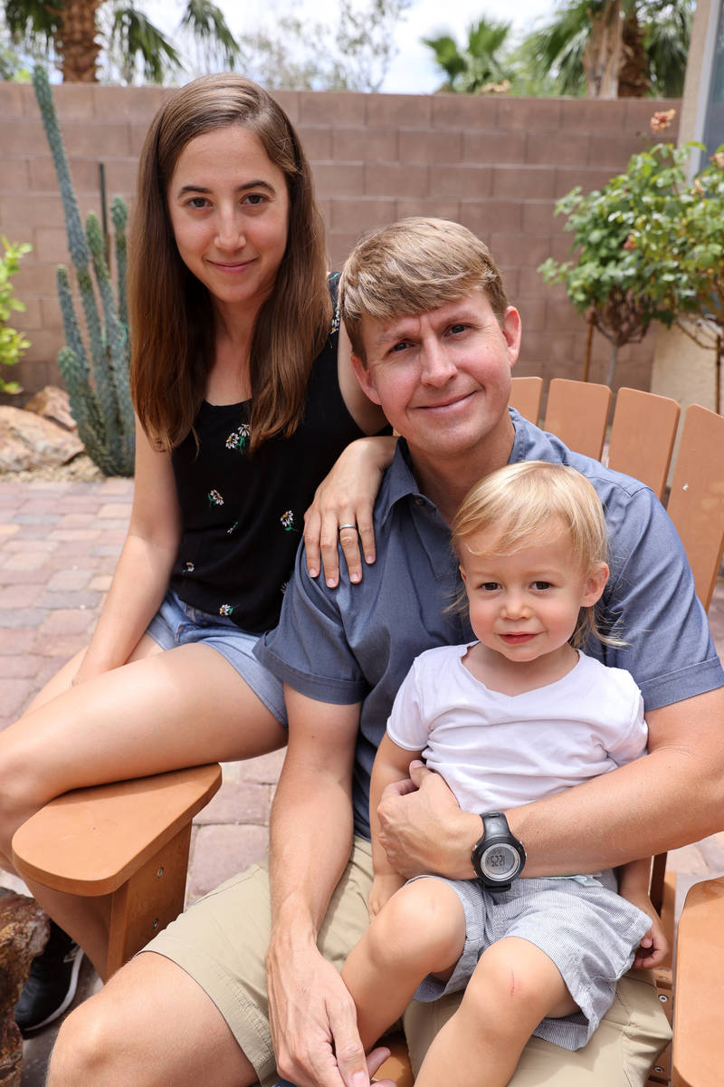 Shane Peterson with his wife, Rachel, and son, Henry, 21 months, at his Henderson home on June ...