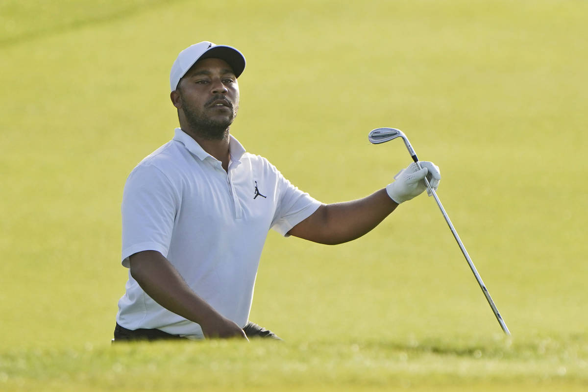 Harold Varner III looks to see where his chip shot landed on the 11th green during the first ro ...