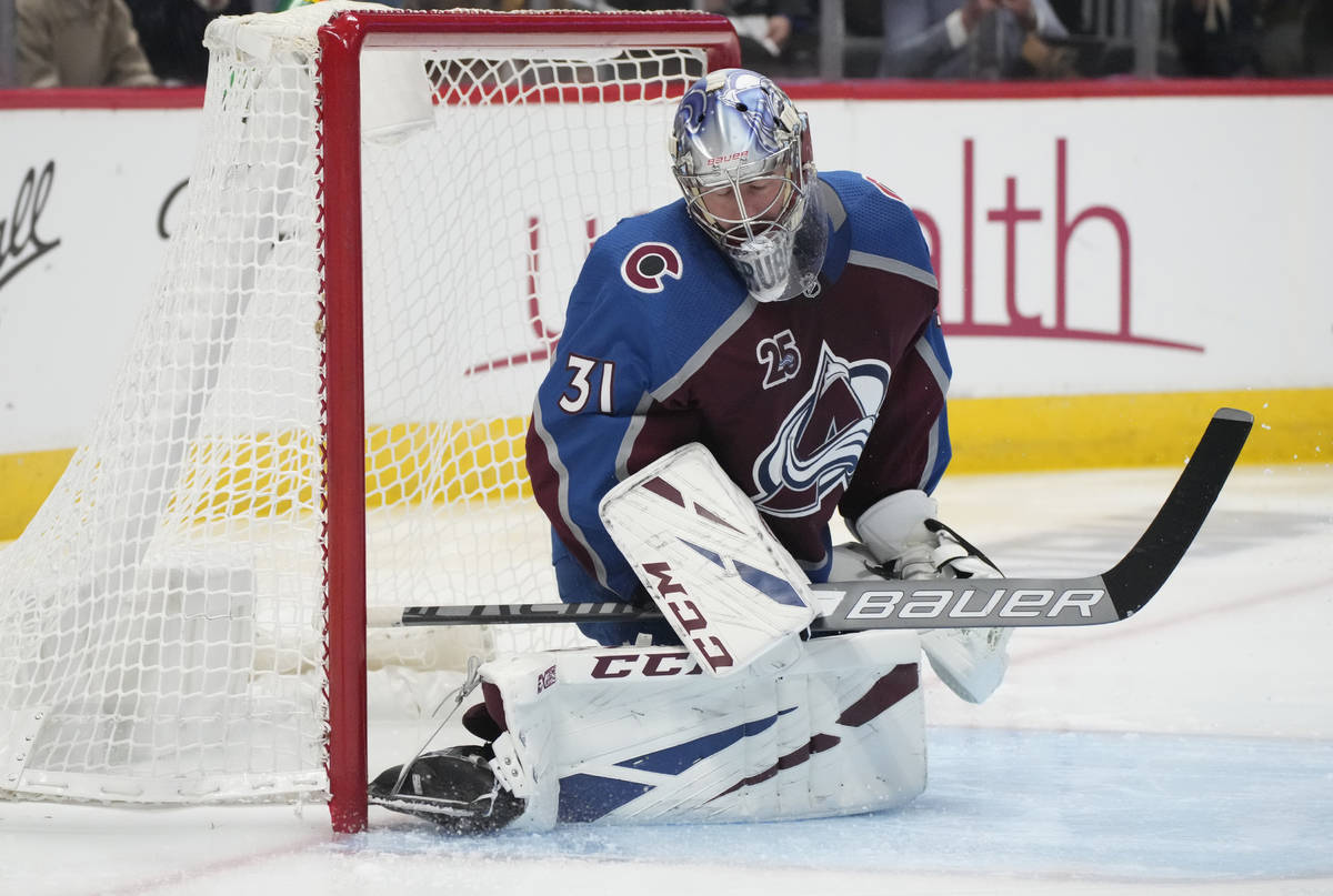 Colorado Avalanche goaltender Philipp Grubauer reacts after giving up a goal to Vegas Golden Kn ...