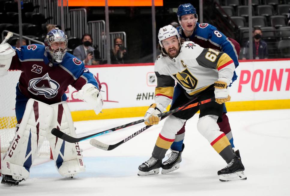 Vegas Golden Knights right wing Mark Stone, front right, calls for the puck while covered by Co ...