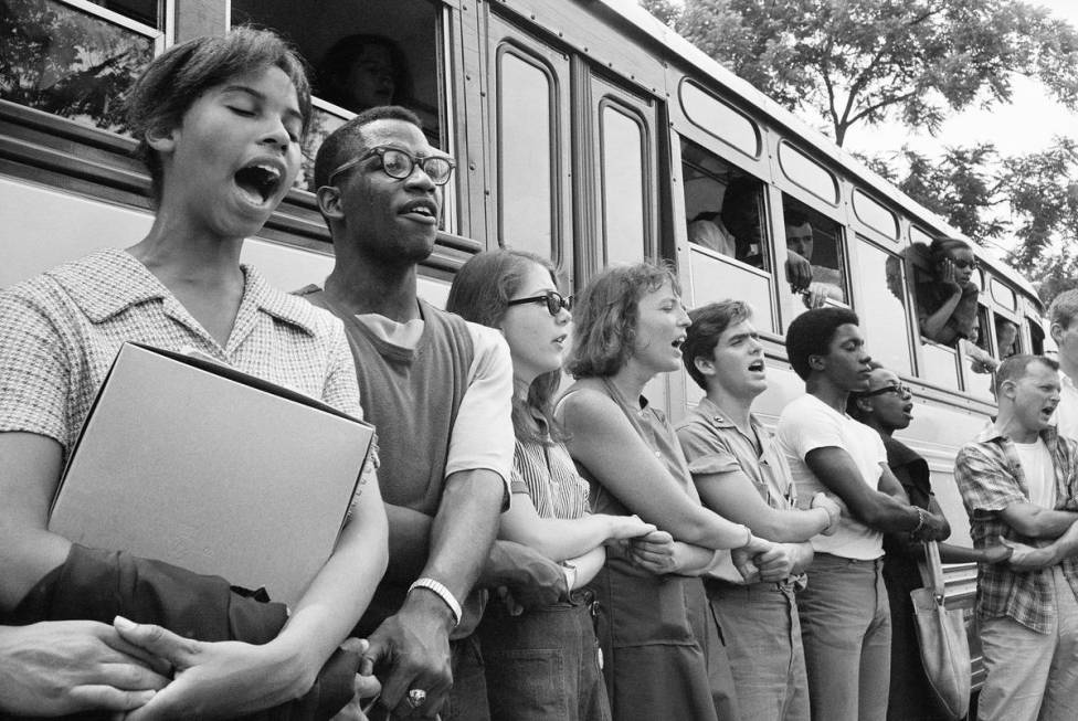 Singing “We Shall Overcome,” this group of volunteers begins its journey from Oxford, Ohio, ...