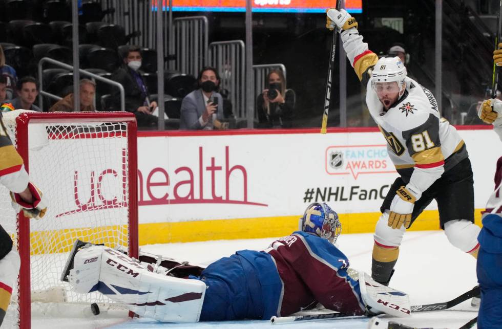 Vegas Golden Knights center Jonathan Marchessault, right, reacts after soring a goal past Color ...