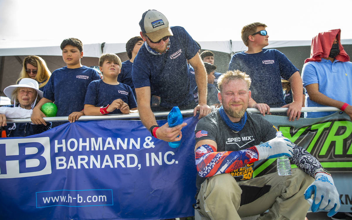 Tender Luke Wikander is cooled off after setting up for the Spec Mix Bricklayer 500 during Worl ...