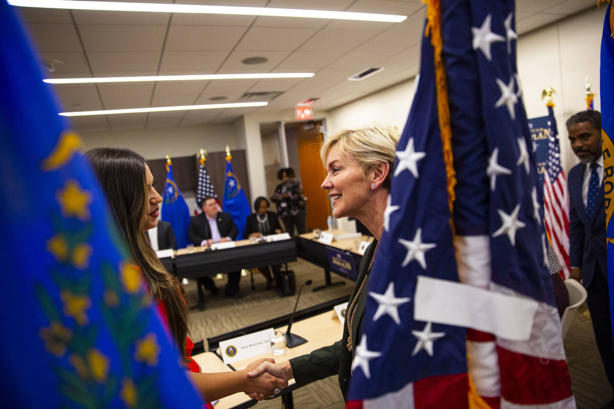 Energy Secretary Jennifer Granholm, right, greets Verna Mandez, deputy director of the Nevada C ...