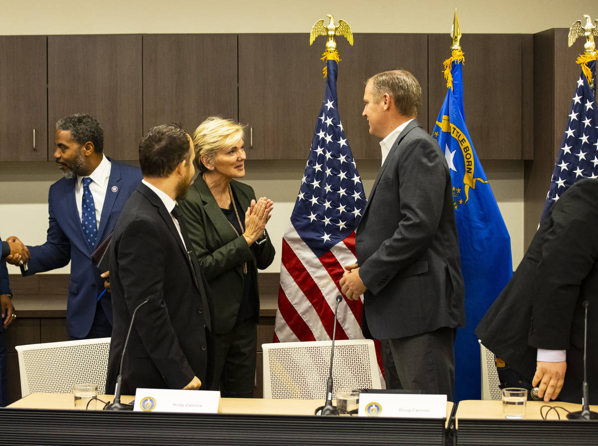 Energy Secretary Jennifer Granholm, third from left, greets Doug Cannon, president and CEO of N ...