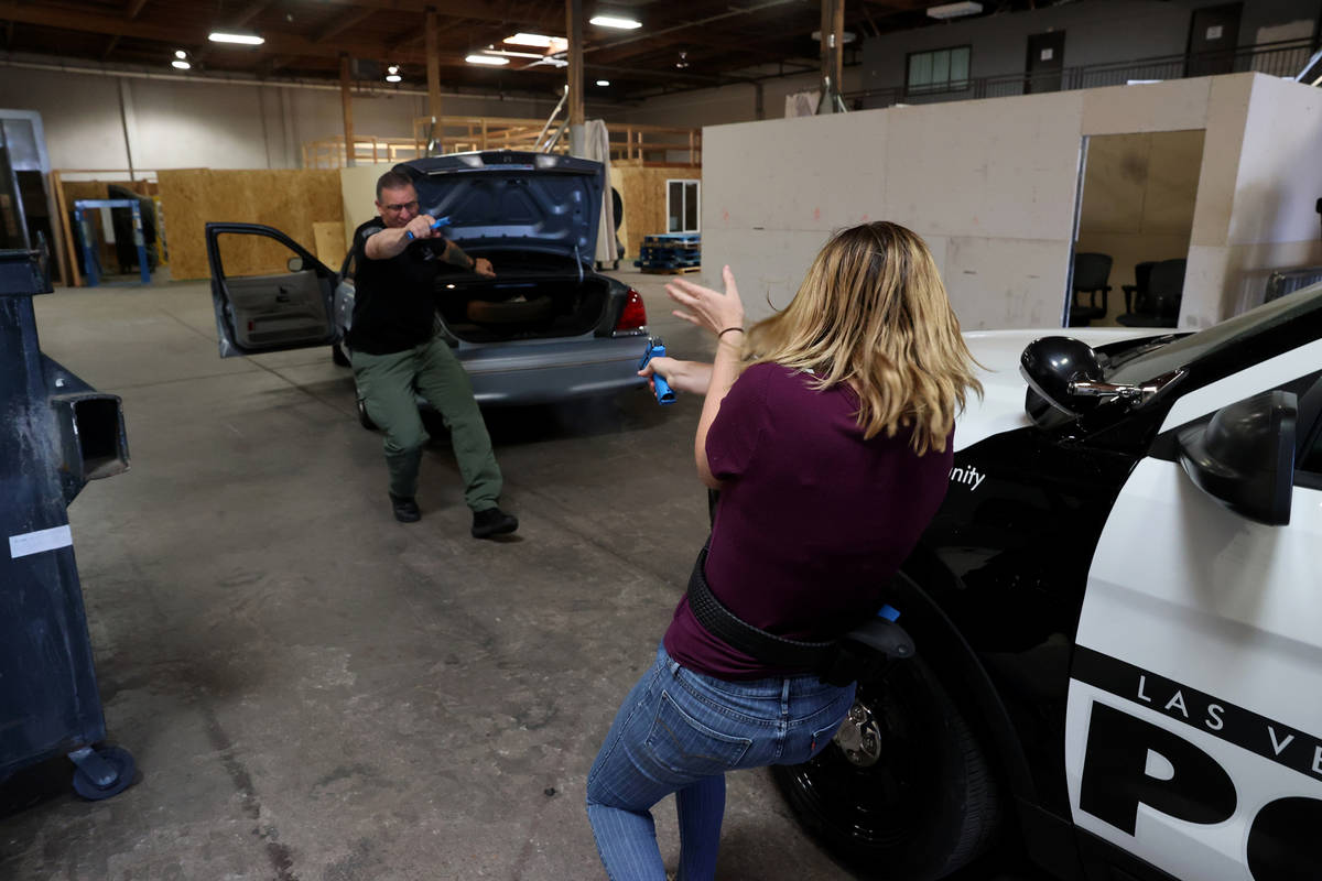 Las Vegas Review-Journal reporter Katelyn Newberg confronts a suspect during a traffic stop du ...