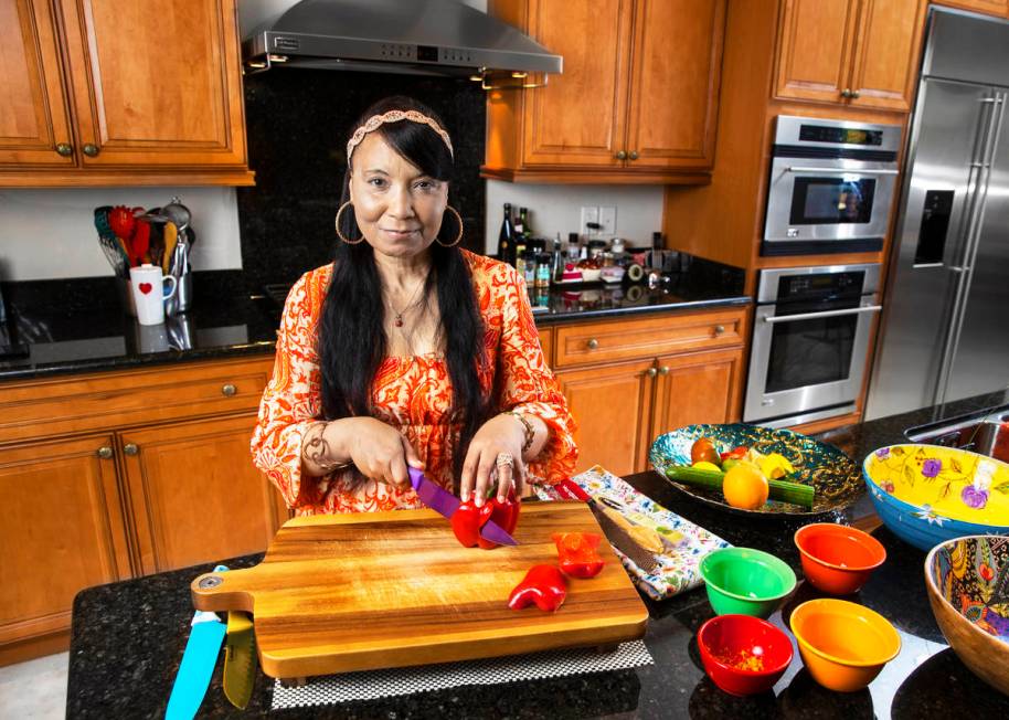 Chef/instructor Regina Mitchell works with Blindconnect to teach blind and low vision people ho ...