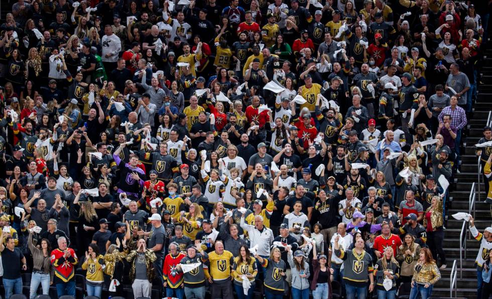 Golden Knights fans celebrate another goal over the Colorado Avalanche during the third period ...