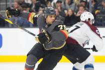 Golden Knights right wing Ryan Reaves (75) fights for position with Colorado Avalanche left win ...