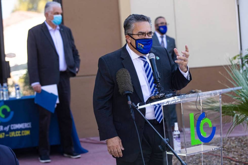Peter Guzman, president of the Latin Chamber of Commerce, speaks during a press conference anno ...
