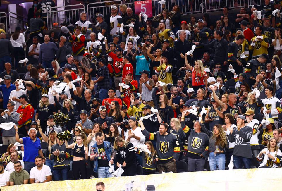 Golden Knights fans cheer at the end of the second period of Game 4 of an NHL hockey Stanley Cu ...