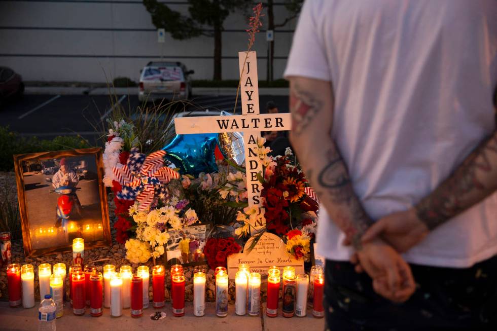 Friends and family mourn at a vigil for Walter Anderson near the intersection where he was kill ...